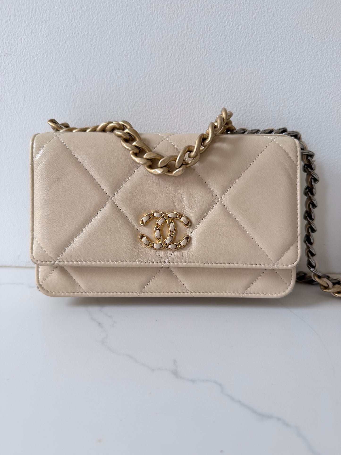 Quilted Chanel 19 Wallet On Chain Light Beige