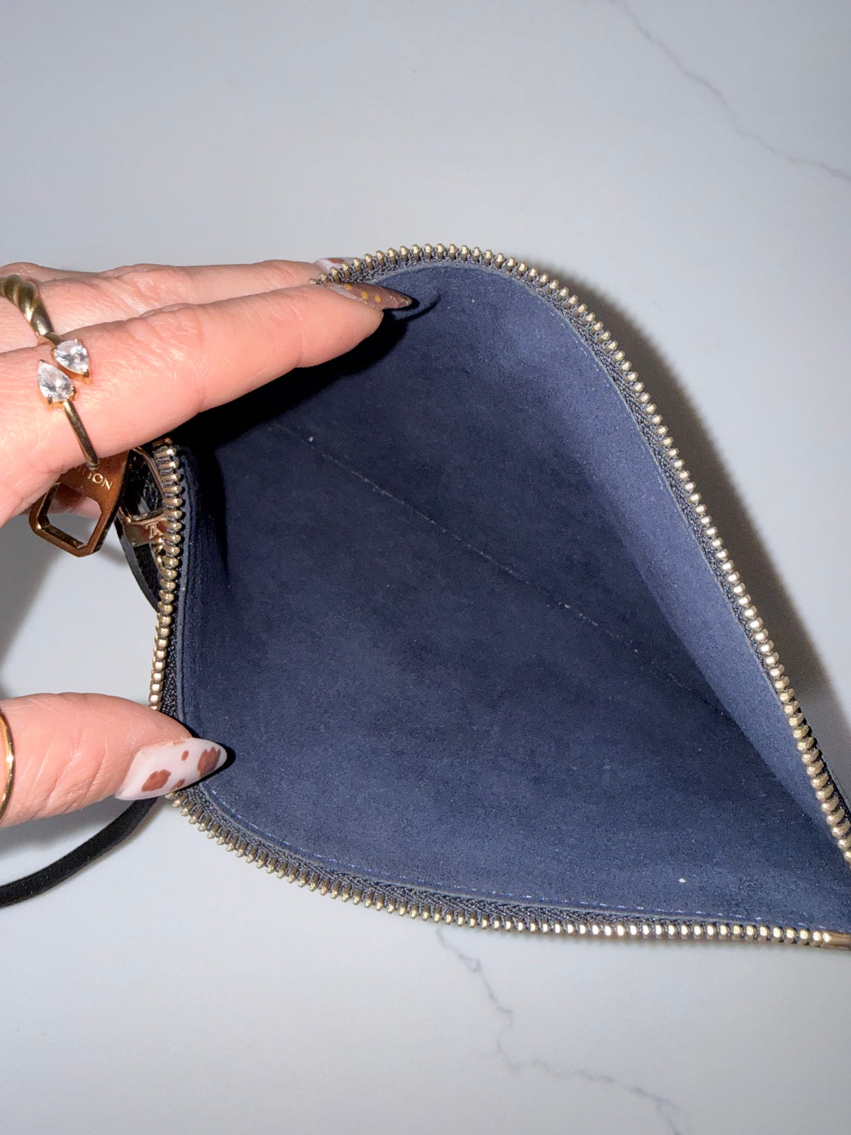 Louis Vuitton Neverfull Wristlet Empreinte