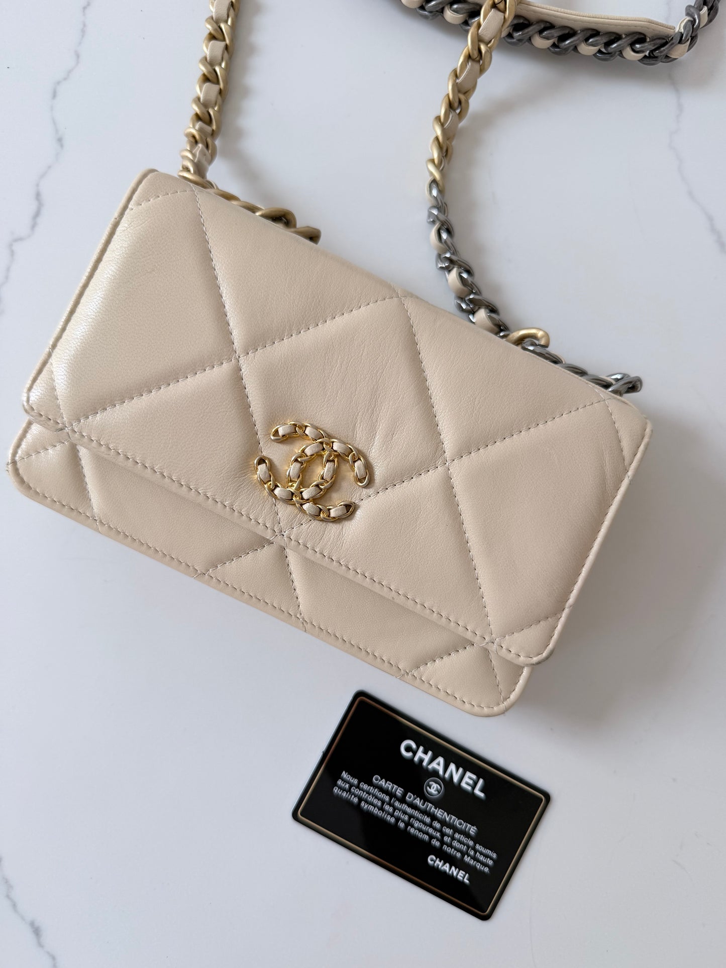 Quilted Chanel 19 Wallet On Chain Light Beige