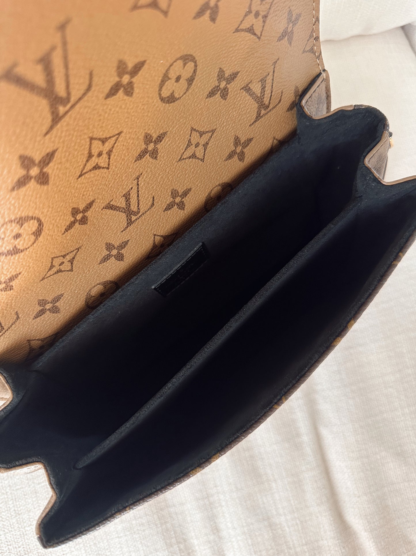 Louis Vuitton Reverse Monogram Metis Pochette